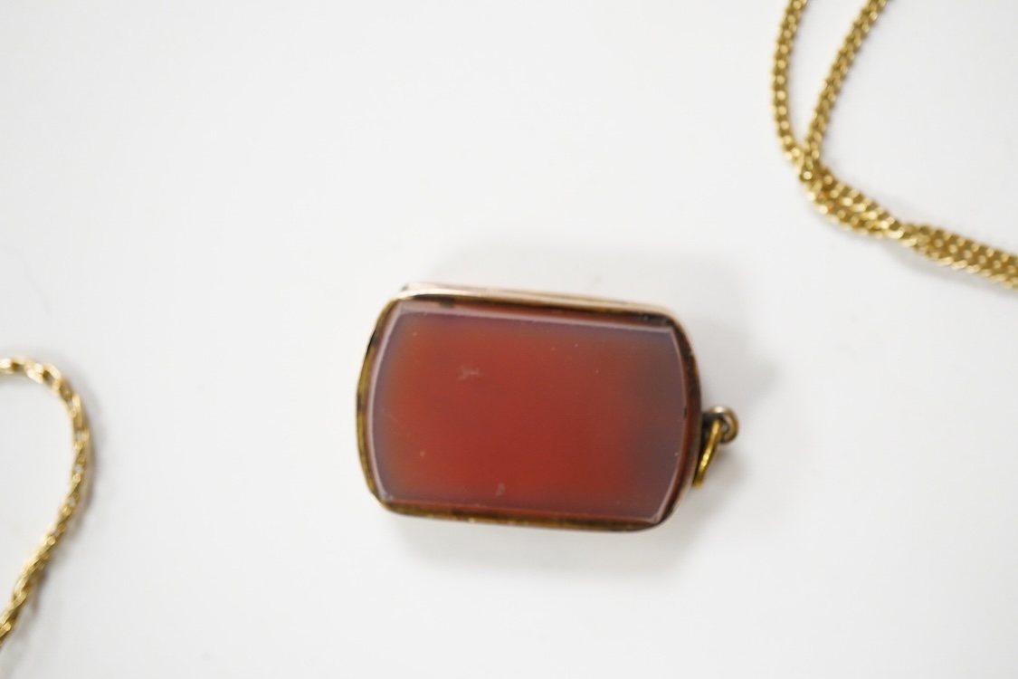 An 800 standard gilt white metal and garnet cluster set oval pendant, 18mm, on a 585 yellow metal fine link chain, 2.5 grams, a gilt white metal and garnet cluster set hinged bangle, two white metal brooches including on